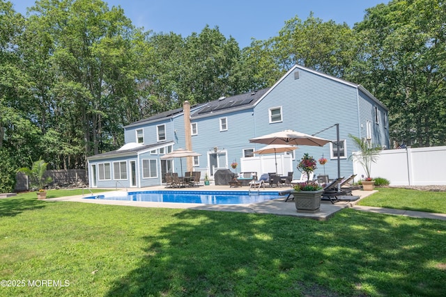 1920 Kenilworth Ct, Toms River, NJ 08753 - rear view of property featuring a fenced backyard, a patio area, an outdoor structure, and outdoor dining area