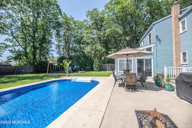 1920 Kenilworth Ct, Toms River, NJ 08753 - view of swimming pool with a patio area, a fenced backyard, a playground, and grilling area