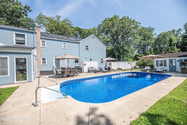 1920 Kenilworth Ct, Toms River, NJ 08753 - view of swimming pool with a patio, outdoor dining area, and an outbuilding