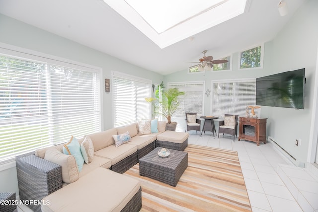 1920 Kenilworth Ct, Toms River, NJ 08753 - living room with a baseboard heating unit, vaulted ceiling, light tile patterned floors, and ceiling fan