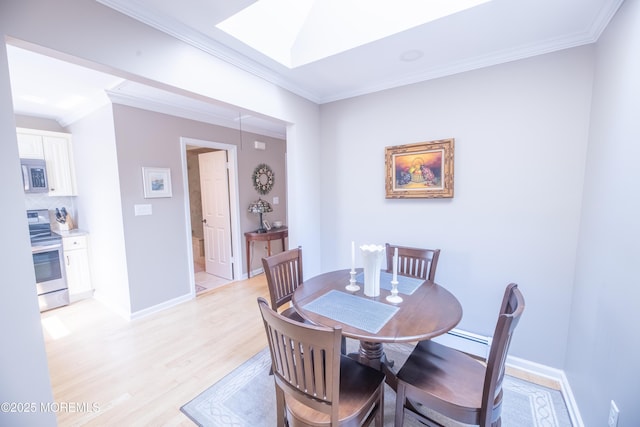 1920 Kenilworth Ct, Toms River, NJ 08753 - dining space with ornamental molding, light wood-type flooring, and a skylight