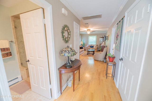 1920 Kenilworth Ct, Toms River, NJ 08753 - hallway featuring a baseboard radiator, crown molding, and light wood-style floors