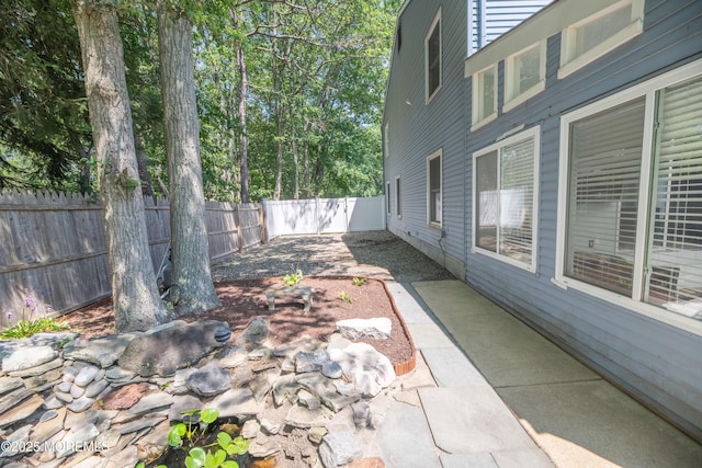 1920 Kenilworth Ct, Toms River, NJ 08753 - fenced backyard featuring a patio area