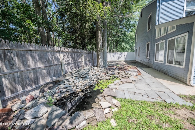 1920 Kenilworth Ct, Toms River, NJ 08753 - fenced backyard with a patio