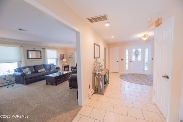 1920 Kenilworth Ct, Toms River, NJ 08753 - foyer entrance with plenty of natural light, light carpet, light tile patterned floors, and crown molding