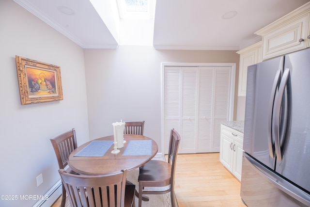 1920 Kenilworth Ct, Toms River, NJ 08753 - dining room featuring light wood-style flooring, crown molding, and a baseboard heating unit