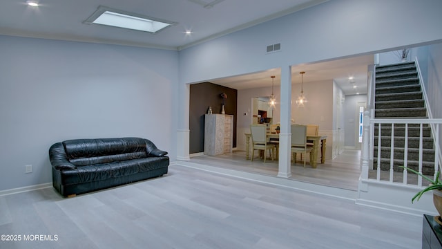 57 Chestnut Way, Manalapan, NJ 07726 - sitting room featuring stairs, wood finished floors, recessed lighting, and ornamental molding