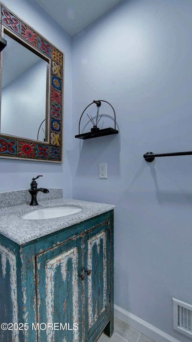 57 Chestnut Way, Manalapan, NJ 07726 - bathroom with vanity and baseboards