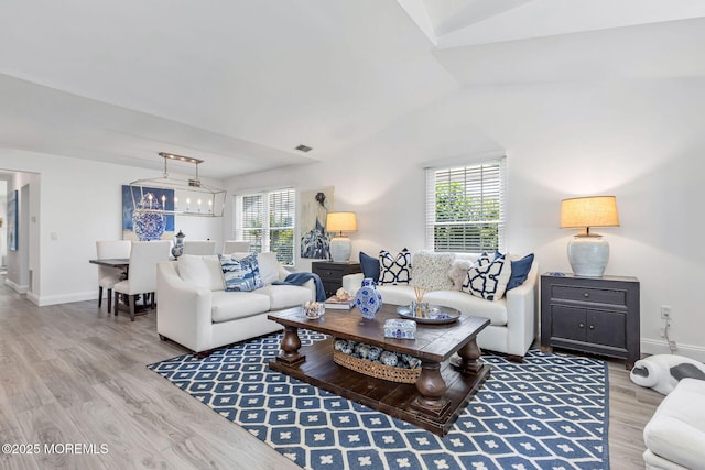 2254 S Chanticleer Ct, Toms River, NJ 08755 - living room with light wood-style flooring, plenty of natural light, and vaulted ceiling