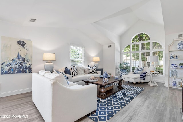 2254 S Chanticleer Ct, Toms River, NJ 08755 - living room featuring vaulted ceiling and wood finished floors