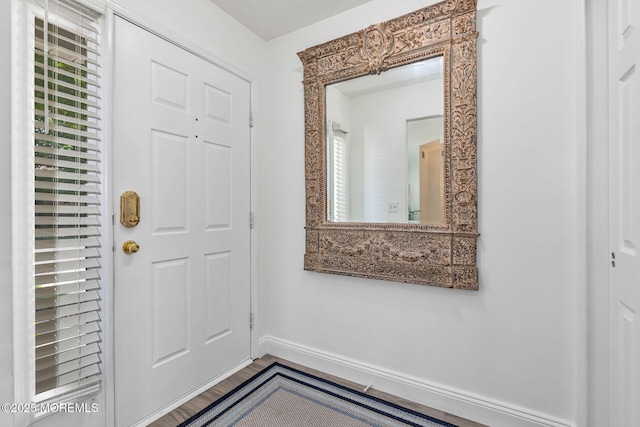 2254 S Chanticleer Ct, Toms River, NJ 08755 - foyer entrance with baseboards and wood finished floors