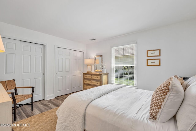 2254 S Chanticleer Ct, Toms River, NJ 08755 - bedroom with wood finished floors and multiple closets