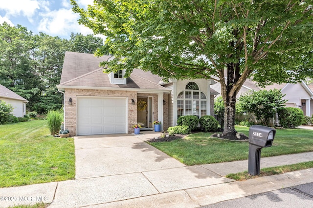 2254 S Chanticleer Ct, Toms River, NJ 08755 - view of front facade with brick siding, driveway, a garage, and a front lawn