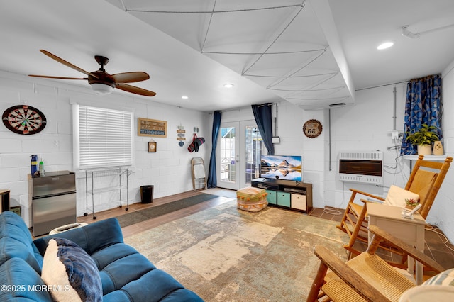 307 Webster Ave, Seaside Heights, NJ 08751 - living area with heating unit, concrete block wall, a ceiling fan, and recessed lighting
