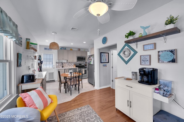 307 Webster Ave, Seaside Heights, NJ 08751 - kitchen featuring stainless steel appliances, light countertops, decorative backsplash, plenty of natural light, and recessed lighting