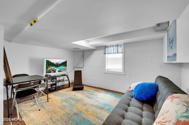 307 Webster Ave, Seaside Heights, NJ 08751 - living room featuring wood finished floors and concrete block wall