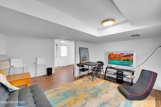 307 Webster Ave, Seaside Heights, NJ 08751 - living room with a raised ceiling and baseboards