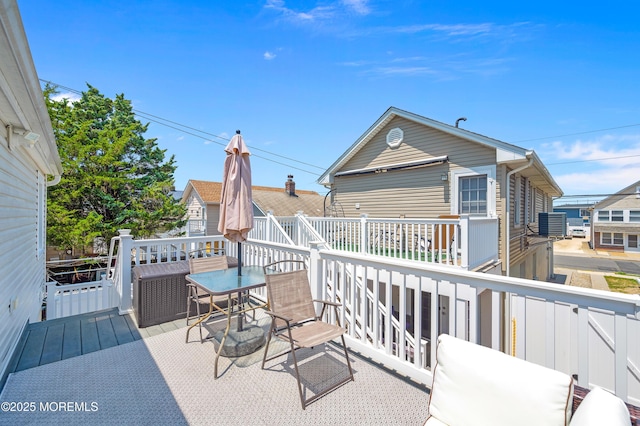 307 Webster Ave, Seaside Heights, NJ 08751 - view of patio with a wooden deck, stairs, and outdoor dining space
