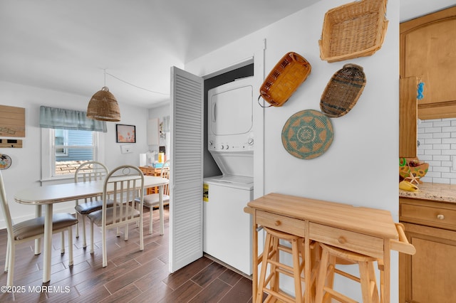 307 Webster Ave, Seaside Heights, NJ 08751 - washroom with stacked washer / drying machine and dark wood-style floors