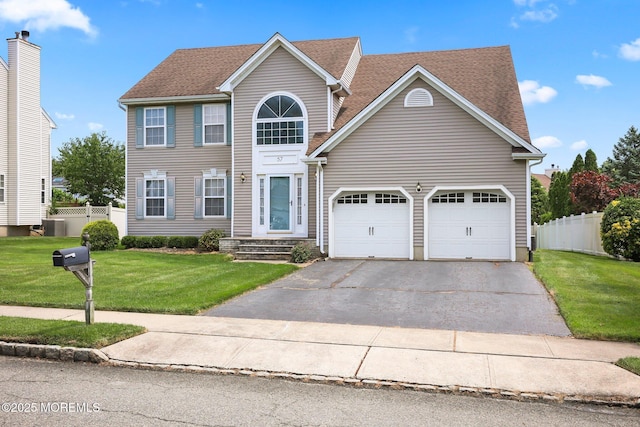 57 High Pointe Way, Matawan, NJ 07747 - view of front of property featuring driveway, an attached garage, and roof with shingles