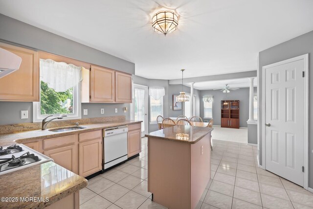 57 High Pointe Way, Matawan, NJ 07747 - kitchen featuring dishwasher, light brown cabinetry, a center island, cooktop, and light tile patterned flooring