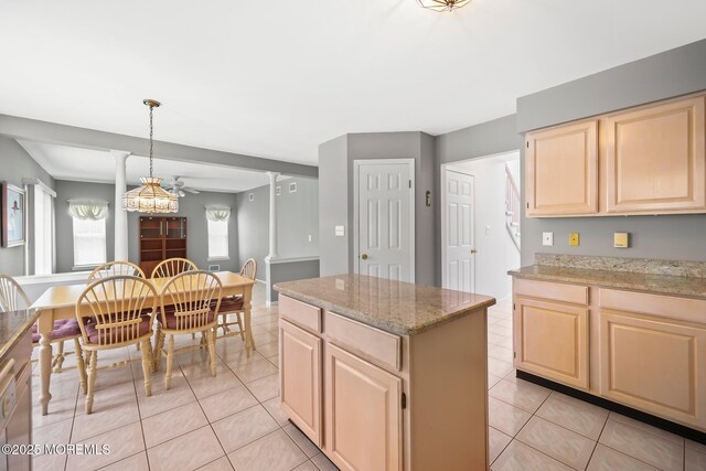 57 High Pointe Way, Matawan, NJ 07747 - kitchen featuring light brown cabinets, light tile patterned flooring, and ornate columns