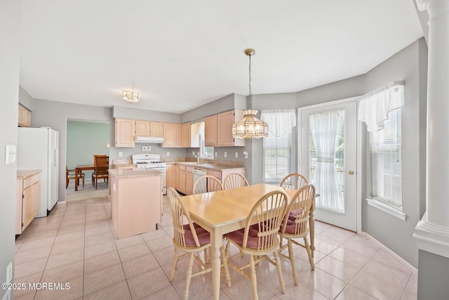 57 High Pointe Way, Matawan, NJ 07747 - dining space with light tile patterned floors and a chandelier