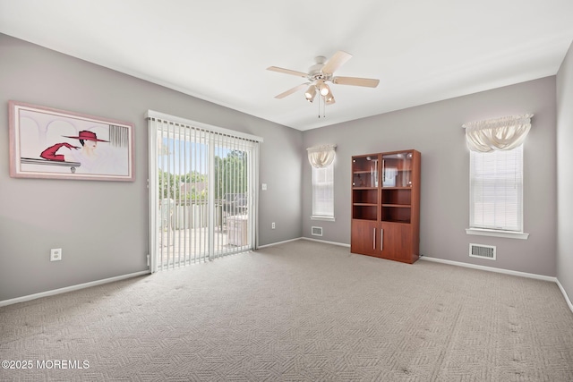 57 High Pointe Way, Matawan, NJ 07747 - carpeted spare room with a ceiling fan and baseboards