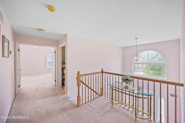 57 High Pointe Way, Matawan, NJ 07747 - hallway with an upstairs landing and carpet