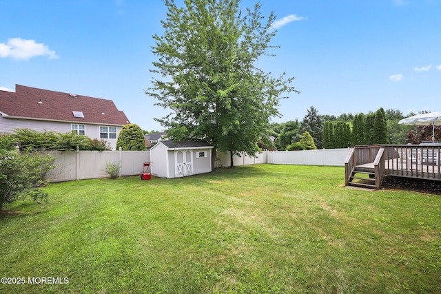 57 High Pointe Way, Matawan, NJ 07747 - fenced backyard with a storage unit and a wooden deck