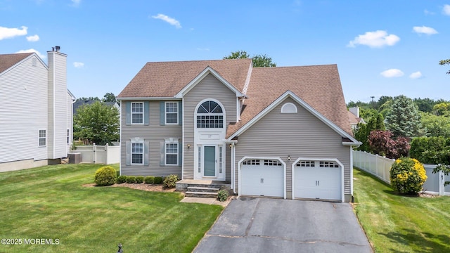 57 High Pointe Way, Matawan, NJ 07747 - view of front of property featuring asphalt driveway, a garage, and a shingled roof