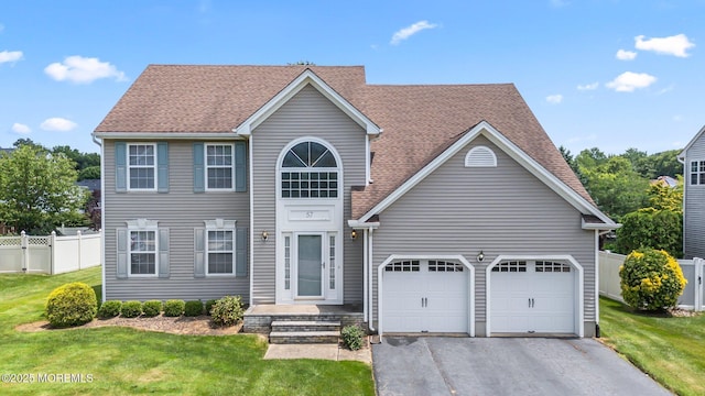 57 High Pointe Way, Matawan, NJ 07747 - view of front of house with asphalt driveway, an attached garage, and a shingled roof