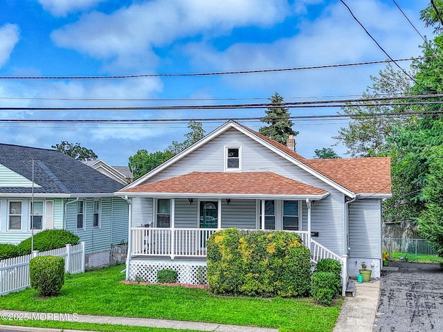 198 W Sylvania Ave, Neptune City, NJ 07753 - bungalow-style house featuring covered porch and roof with shingles