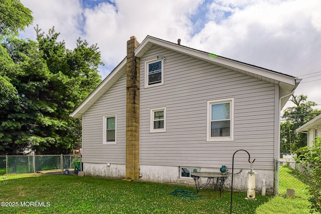 198 W Sylvania Ave, Neptune City, NJ 07753 - view of home's exterior featuring a chimney