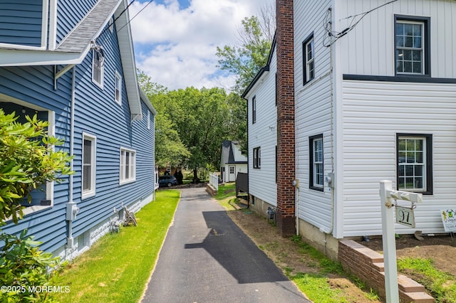 101 Broad St, Matawan, NJ 07747 - view of property exterior featuring driveway