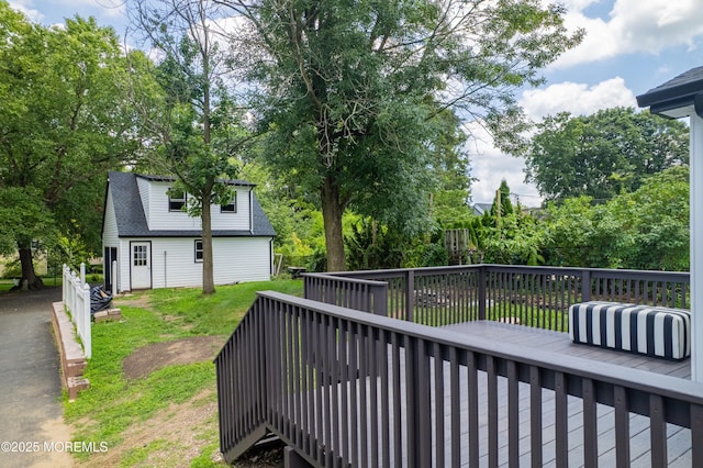 101 Broad St, Matawan, NJ 07747 - wooden deck featuring a lawn