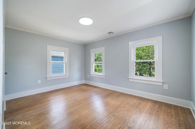 101 Broad St, Matawan, NJ 07747 - unfurnished room with light wood-style floors and crown molding