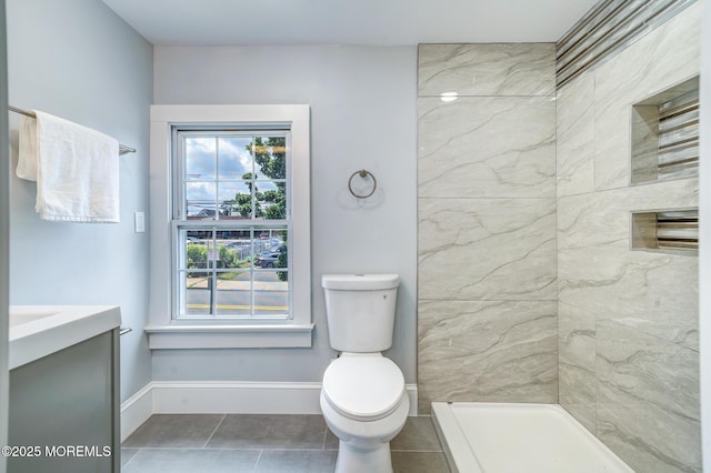 101 Broad St, Matawan, NJ 07747 - bathroom featuring tile patterned floors, vanity, and a shower