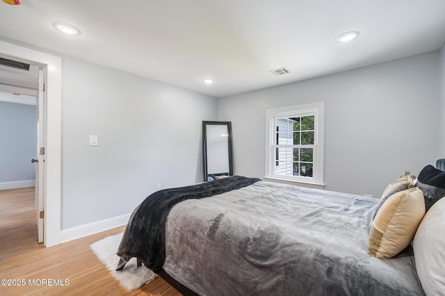 101 Broad St, Matawan, NJ 07747 - bedroom with light wood-style floors and recessed lighting