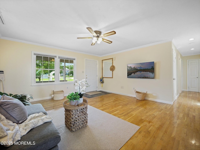 962 Columbus Dr, Brick, NJ 08724 - living area with crown molding, wood finished floors, a ceiling fan, and recessed lighting