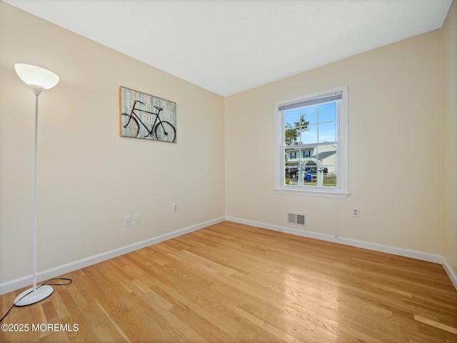 962 Columbus Dr, Brick, NJ 08724 - empty room with light wood-style floors and baseboards