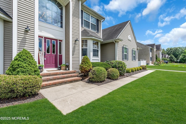 1667 Kalvel Ct, Toms River, NJ 08755 - doorway to property featuring a yard and roof with shingles