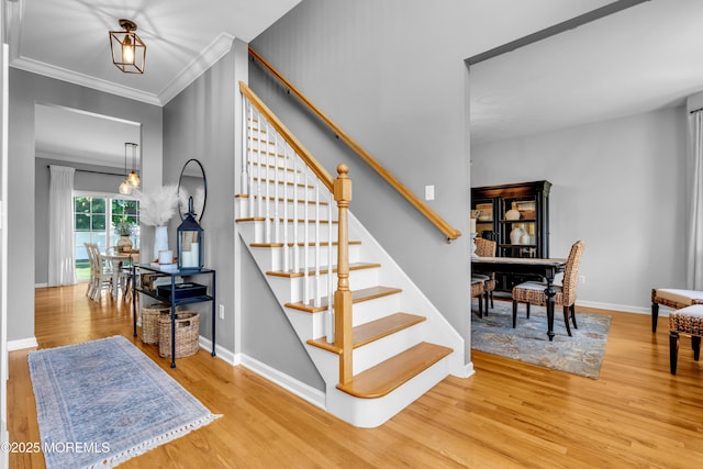 1667 Kalvel Ct, Toms River, NJ 08755 - stairway featuring wood finished floors and crown molding