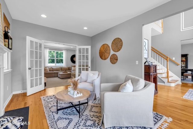 1667 Kalvel Ct, Toms River, NJ 08755 - living room with french doors, stairs, wood finished floors, and recessed lighting