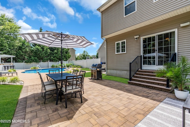 1667 Kalvel Ct, Toms River, NJ 08755 - fenced backyard with a grill, entry steps, a patio, and outdoor dining space