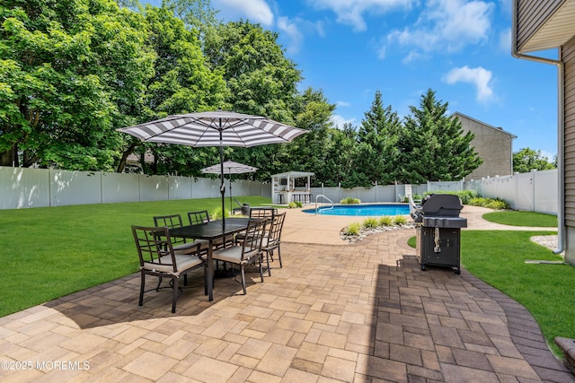 1667 Kalvel Ct, Toms River, NJ 08755 - fenced backyard featuring grilling area, a patio, and outdoor dining space