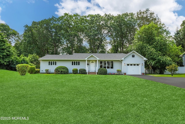 10 Locust Grove Ln, Manalapan, NJ 07726 - ranch-style house featuring an attached garage, asphalt driveway, a front yard, and roof with shingles