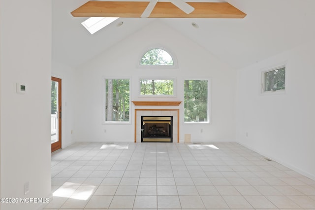 10 Locust Grove Ln, Manalapan, NJ 07726 - unfurnished living room featuring high vaulted ceiling, a tiled fireplace, a skylight, light tile patterned flooring, and beamed ceiling