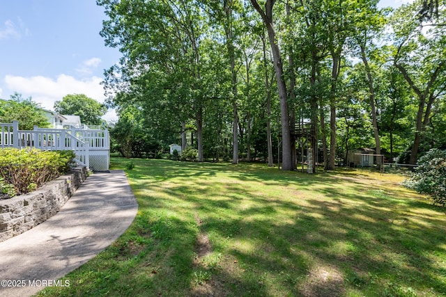 10 Locust Grove Ln, Manalapan, NJ 07726 - view of green lawn featuring a wooden deck