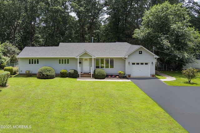 10 Locust Grove Ln, Manalapan, NJ 07726 - ranch-style house with asphalt driveway, an attached garage, a front lawn, and a shingled roof